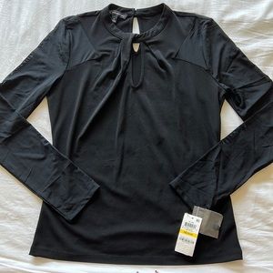 NWT beautiful INC dress top with see thru sleeves size M.